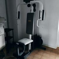 Palestra con bilanciere e serie di dischi