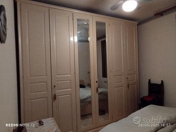 Armadio 6 ante, due specchi