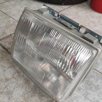 innocenti mini small de Tomaso faro sx nuovo