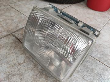 innocenti mini small de Tomaso faro sx nuovo