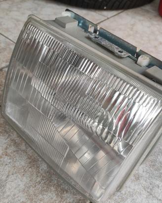 innocenti mini small de Tomaso faro sx nuovo