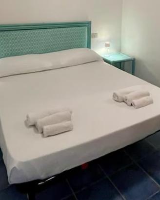 Testiera letto azzurra