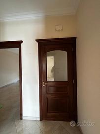 porta in legno con vetro