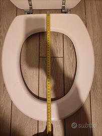 Sedile WC universale.