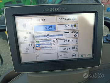 John Deere 6105 R con pala