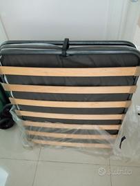 lettino che si chiude compreso di materasso