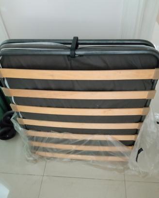 lettino che si chiude compreso di materasso