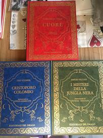 Tre libri copertina rigida editoriale del drago