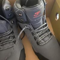 waders con scarponi scierra