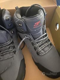 waders con scarponi scierra