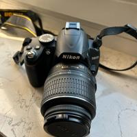 Nikon + zoom 18-55 mm