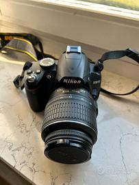 Nikon + zoom 18-55 mm