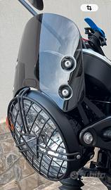 Cupolino e griglia, faro