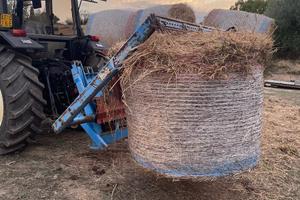 Taglia balloni idraulico