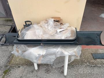 Sottoporta destro sagomato nuovo.