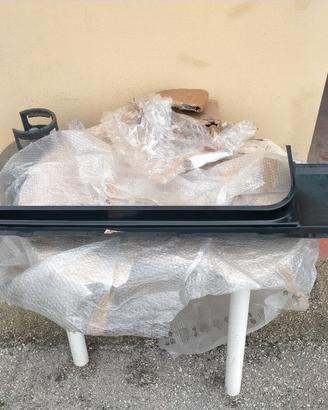 Sottoporta destro sagomato nuovo.