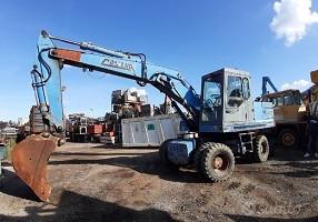 Escavatore gommato colmar ck 15