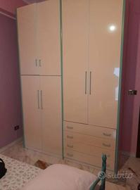 Armadio 4 ante e 4 cassetti