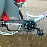 Bici donna con seggiolino bimbo