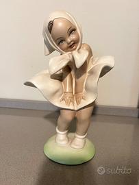 Statua Bambina nel vento - G. Cacciapuoti