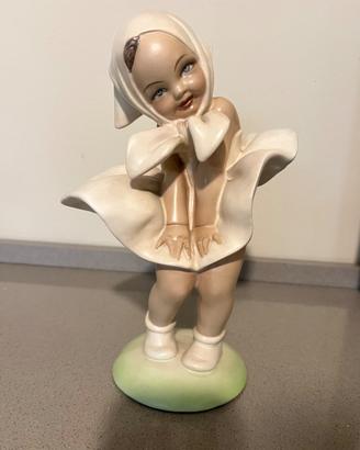 Statua Bambina nel vento - G. Cacciapuoti