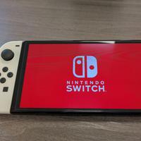Nintendo Switch OLED Bianca + 2 Giochi + Accessori