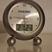 Sveglietta da tavolo con termometro.