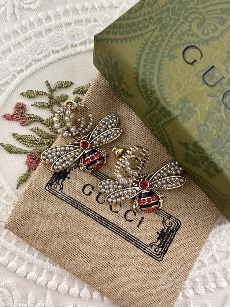 Gucci orecchini ape sale