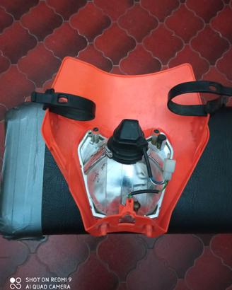 Mascherina porta faro KTM originale