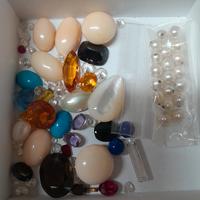 pietre preziose tolte da anelli, orecchini, collan