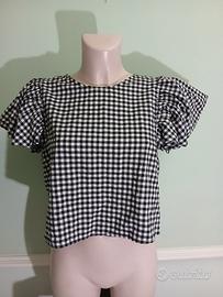 maglia a quadretti con maniche a sbuffo