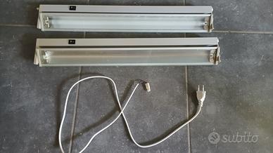 Due luci sottopensile regolabili alluminio/vetro