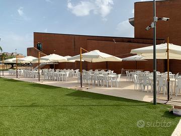 Tavoli sedie ombrelloni