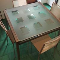 tavolo da pranzo allungabile in metallo e vetro 