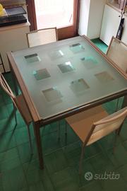 tavolo da pranzo allungabile in metallo e vetro 