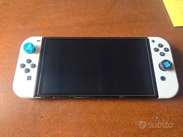 Nintendo Switch Oled + accessori + 1 gioco