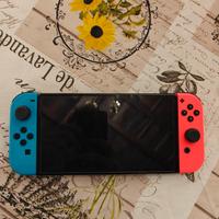 Switch Oled + custodia + Micro SD 128 GB