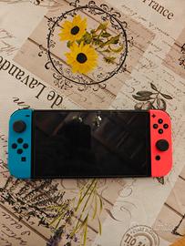 Switch Oled + custodia + Micro SD 128 GB