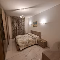 ELEGANTE CAMERA DA LETTO MATRIMONIALE