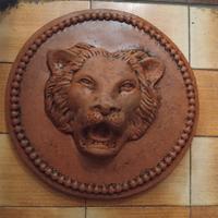 medaglioni cotto ceramico- leone, cavallo, pesce