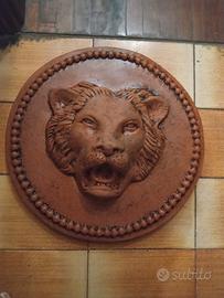 medaglioni cotto ceramico- leone, cavallo, pesce