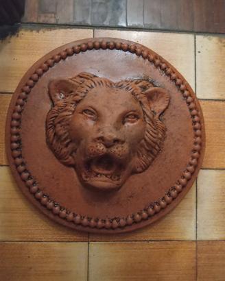 medaglioni cotto ceramico- leone, cavallo, pesce