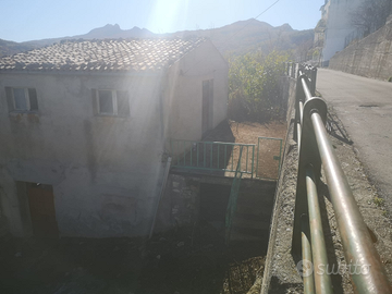 Terreno con immobile