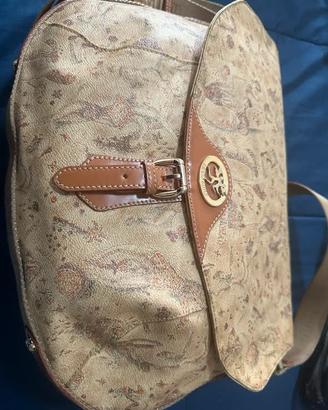 Borsa Piero Guidi deserto dipinto