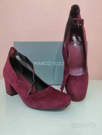 Scarpe donna Decolleté con Cinturino e tacco.