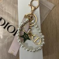 Elemento decorativo o portachiavi