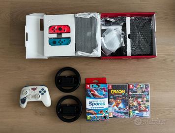 Switch OLED + giochi e accessori