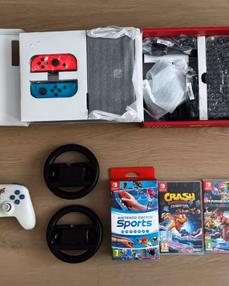 Switch OLED + giochi e accessori