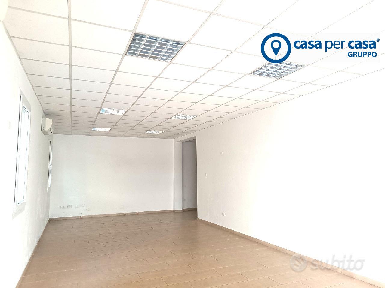 ATTIVITA' COMMERCIALE CON POSTO AUTO RISERVATO - Vista 3