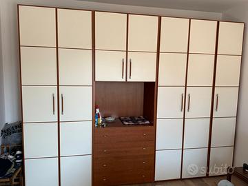 Armadio 7 ante con servetti  4 cassetti